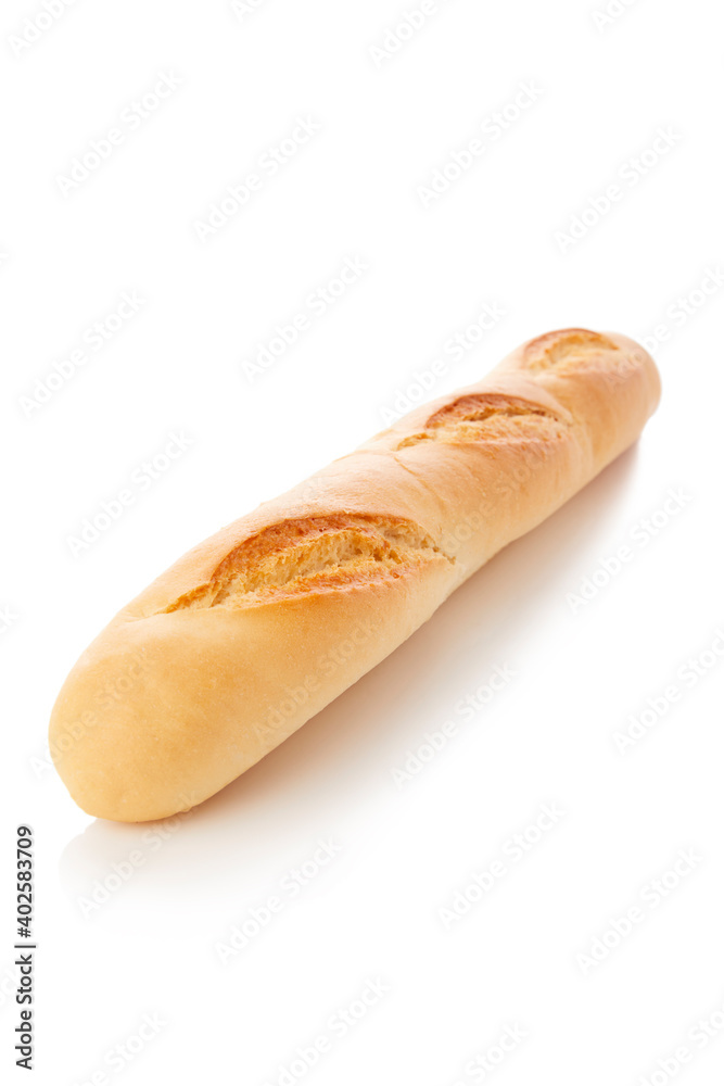 long loaf of whole wheat bread on white background.