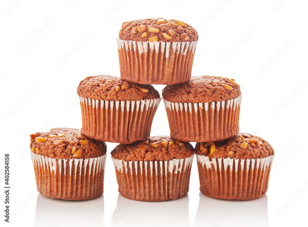Stack of muffins on white background. Stack of muffins on white background.