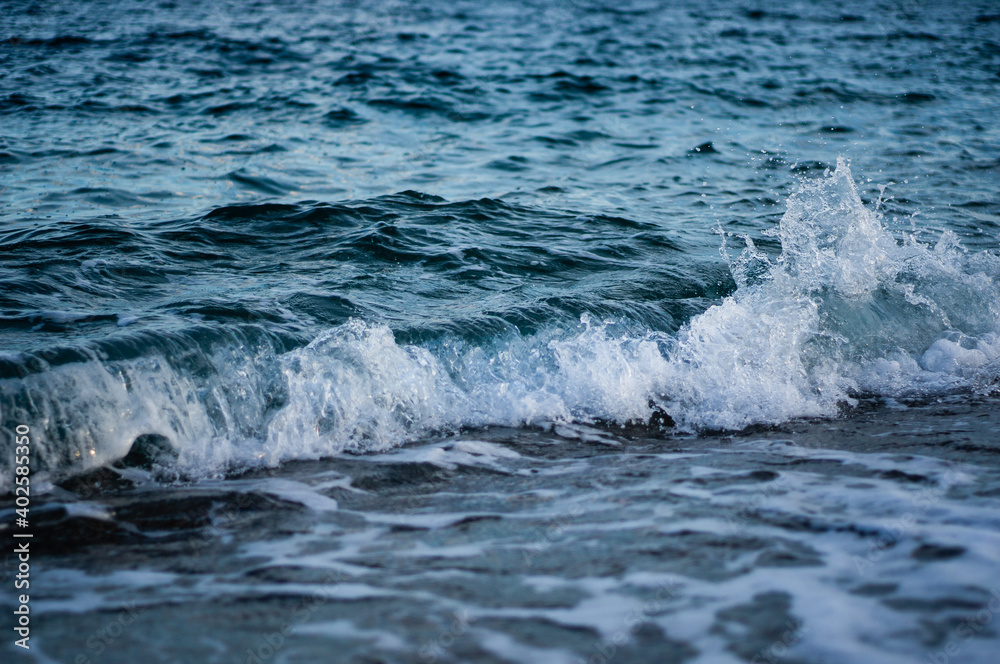 sea waves splash while braking and spray. focus on waves sea waves splash while braking and spray. focus on waves