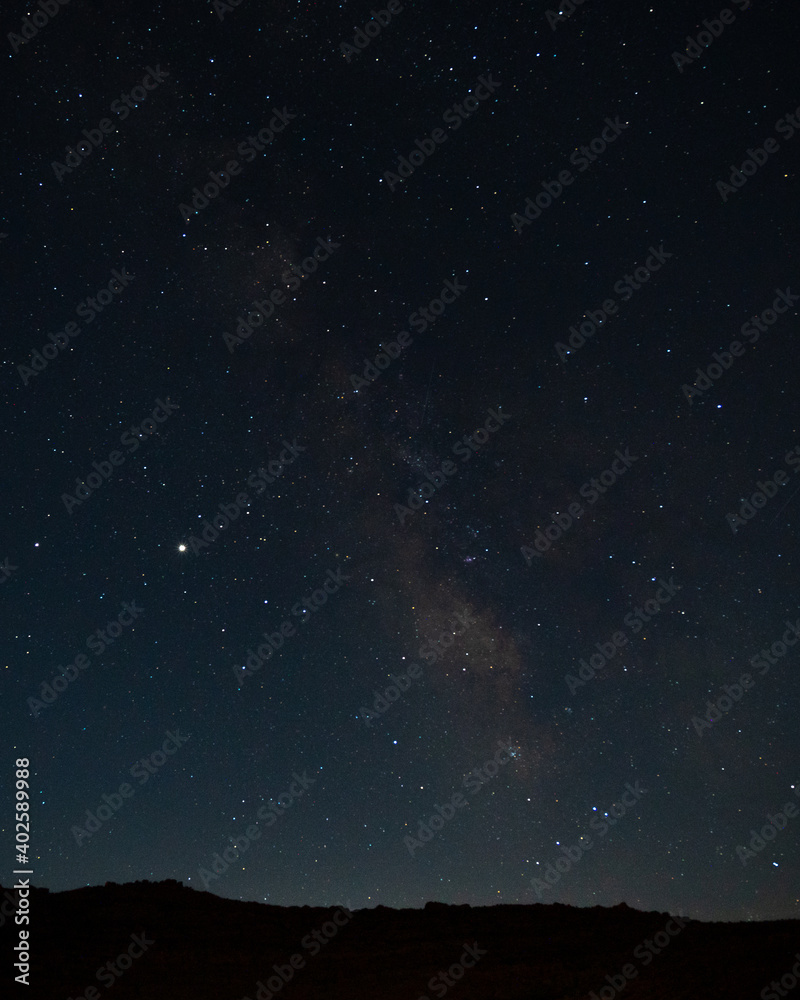 beautiful wide shot of milky way and stars at night