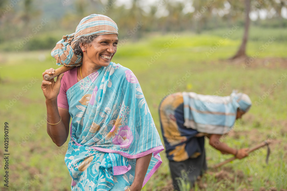 Happy women farmers working on farm field in Tamilnadu. Stock Photo ...