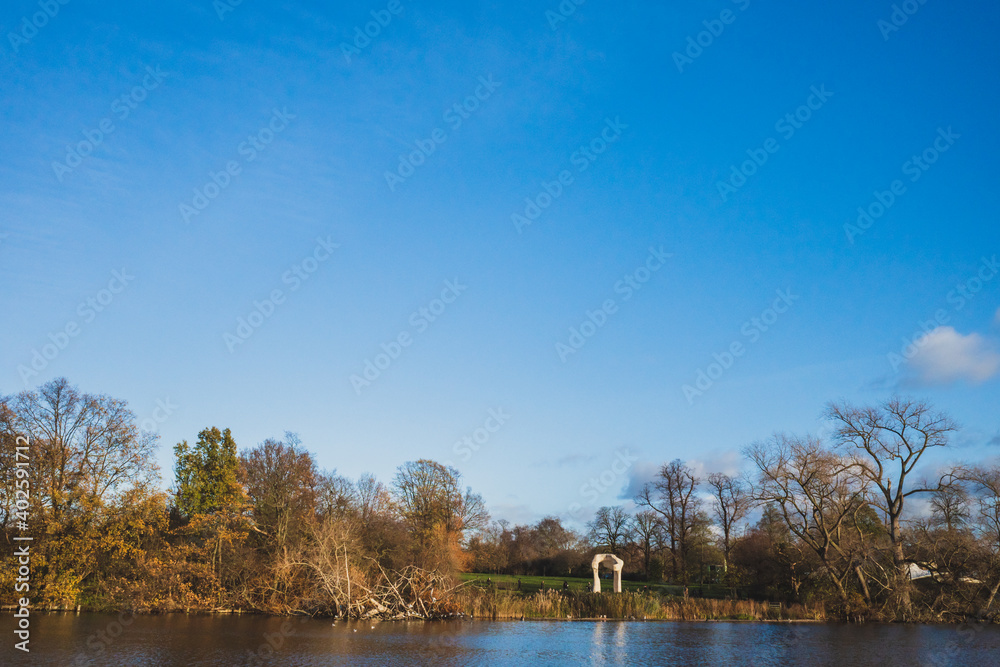 Landscape by river in Hyde Park, London, UK