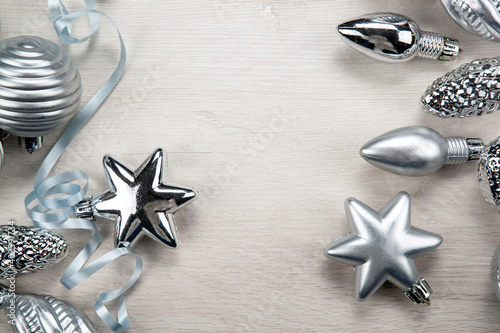 silver christmas glass toys on gray background