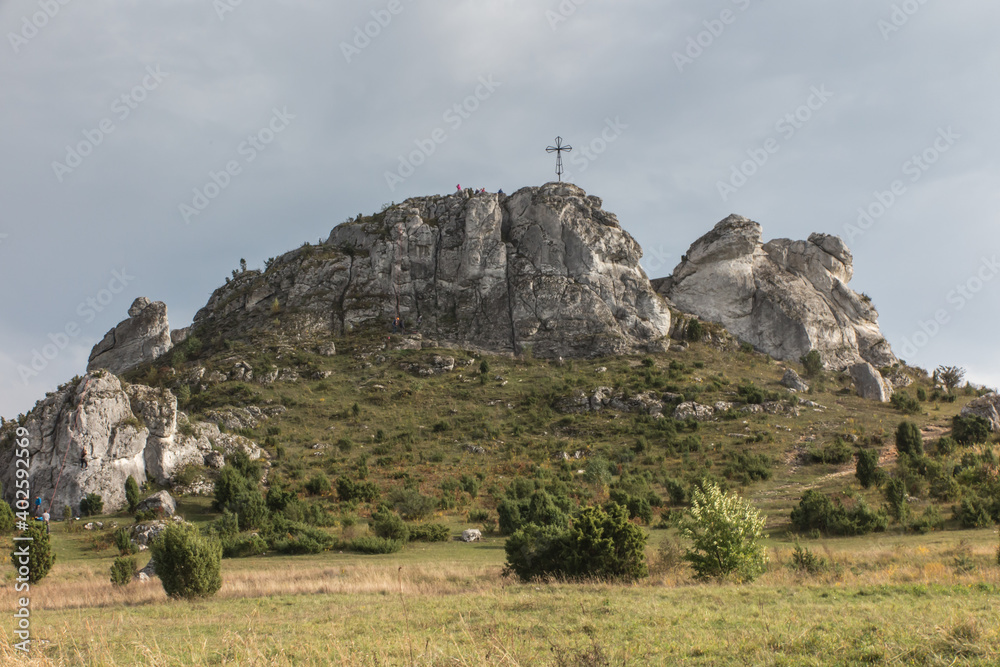 Fototapeta premium The cross on the background of clear sky at the top Biaklo (or Maly Giewont) near Olsztyn near Czestochowa