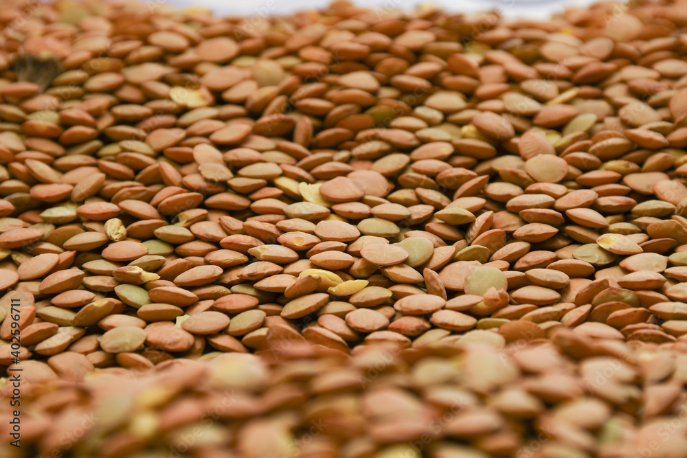Obraz premium Pile of green lentils, low angle close-up view 
