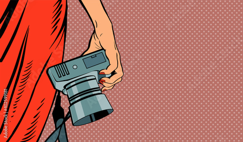 Female hand with a camera. Woman in a red dress. Photographing in the studio. Vector banner illustration in pop art style.