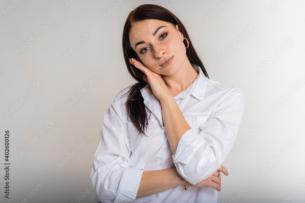 close up portrait, young, nice, attractive, lovely pretty cheerful girl with folded arms isolated over light white background of pastel colors close up portrait, young, nice, attractive, lovely pretty cheerful girl with folded arms isolated over light white background of pastel colors