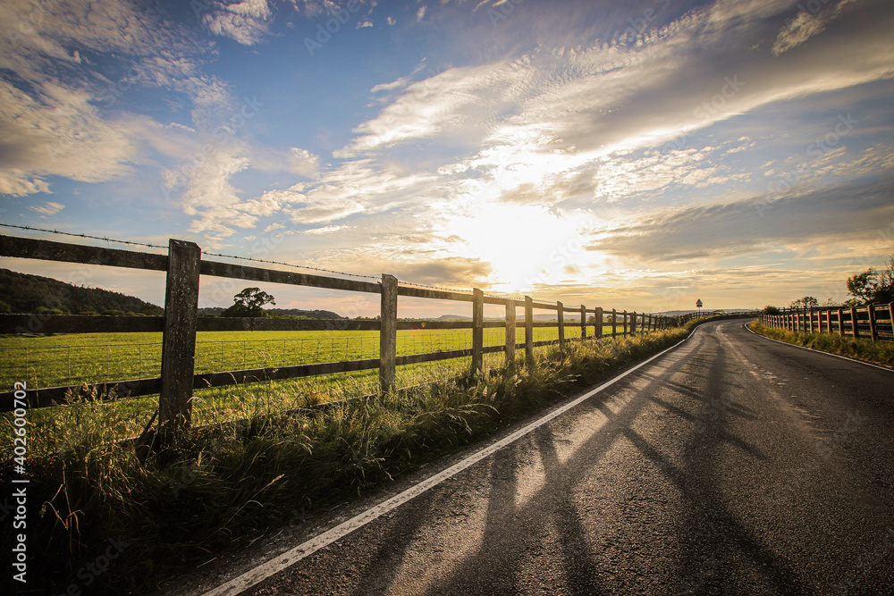 sunset over the fence