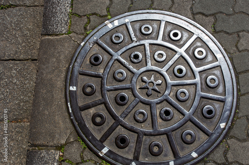 Sewer cover in Kyoto next to Katsura river