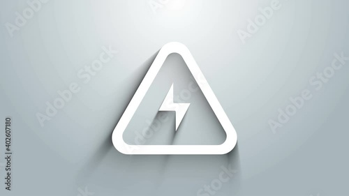 White High voltage icon isolated on grey background. Danger symbol. Arrow in triangle. Warning icon. 4K Video motion graphic animation