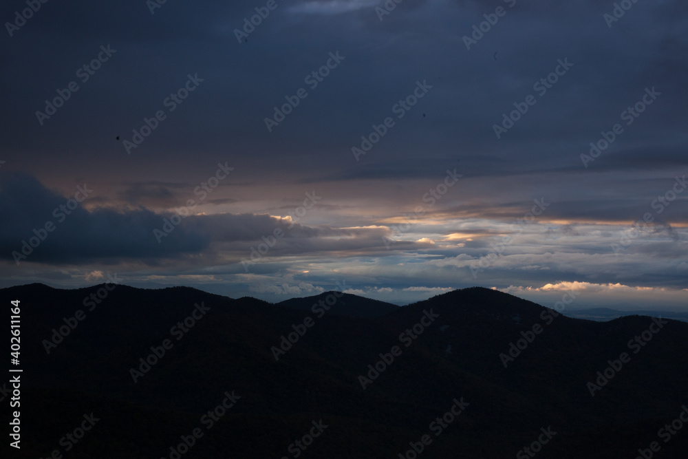 Mountain and sky above