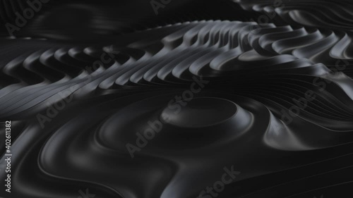 3D looping render of a black liquid waves flowing through an abstract environment.