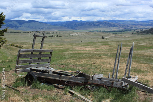 An old wagon in front of a amazing Montana countryside