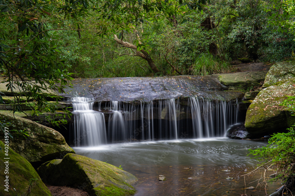 Small waterfall along Terry's creek, Epping, Australia.