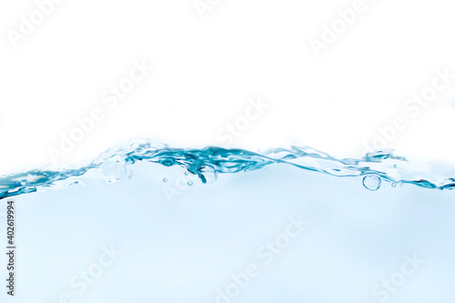 Indigo water waves and bright bubbles isolated on white background.