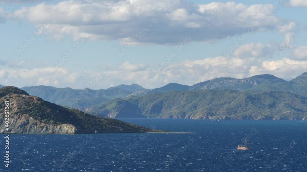Mediterranean sea scenery with pine trees and blue sky windy stormy sea Mediterranean sea scenery with pine trees and blue sky windy stormy sea