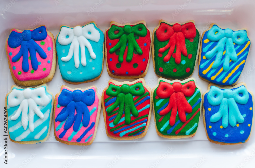 Beautifully decorated homemade Christmas cookies made to look like Christmas presents
