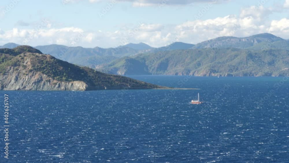 Mediterranean sea scenery with pine trees and blue sky windy stormy sea Mediterranean sea scenery with pine trees and blue sky windy stormy sea