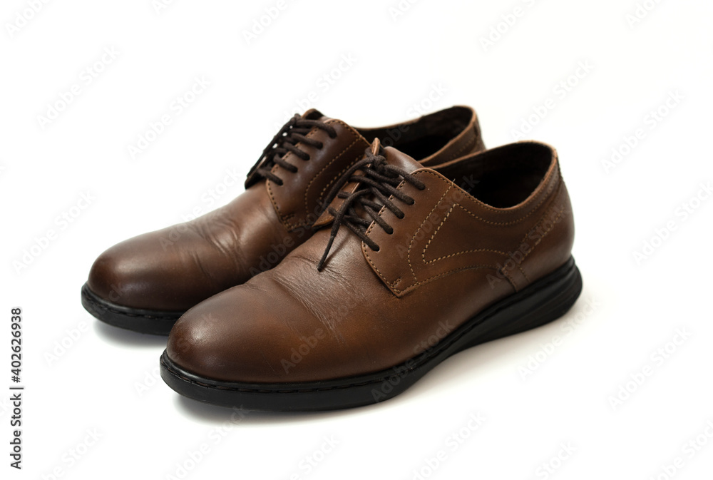 pair of brown leather shoes on white background pair of brown leather shoes on white background