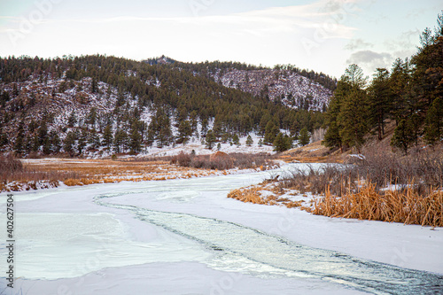 Frozen river by the mountain