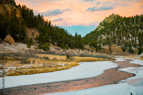 Frozen river by the mountain