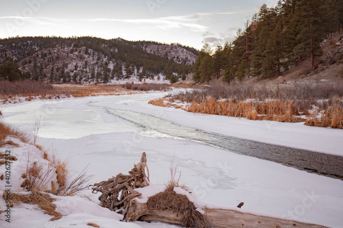 Frozen river by the mountain