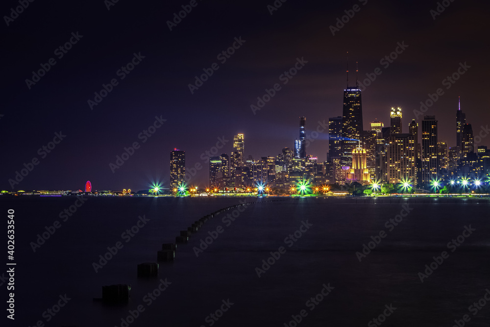 Chicago at twilight seen from the shores of Lake Michigan Chicago at twilight seen from the shores of Lake Michigan