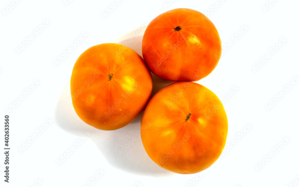 Stock Foto Closeup of yellow orange tomato isolated on white background Stock Foto Closeup of yellow orange tomato isolated on white background