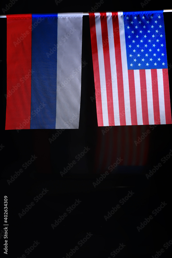 The concept of diplomatic relations. Flag of the Russian Federation and partner. Sanctions pressure in politics.