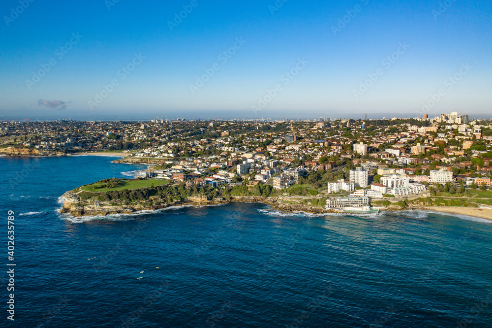 Aerial drone view of Mackenzies Point and iconic Bondi Beach in Sydney, Australia during summer on a sunny morning  