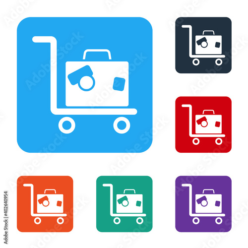 White Hotel luggage cart with suitcase icon isolated on white background. Traveling baggage sign. Travel luggage icon. Set icons in color square buttons. Vector.