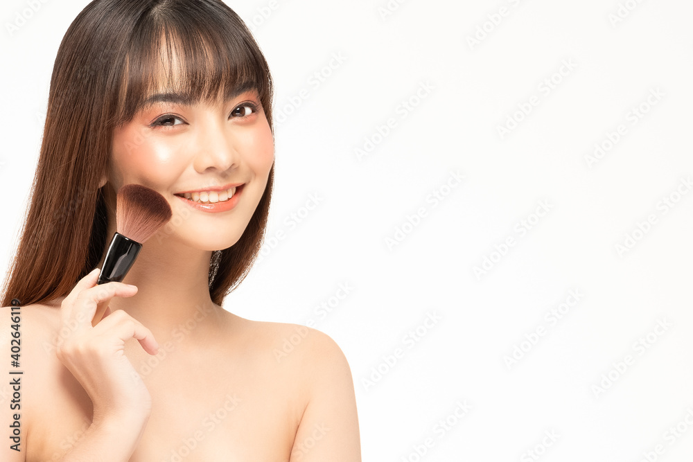 Beauty asian woman hold make up brush and cheerful with make up brush Beauty asian woman hold make up brush and cheerful with make up brush