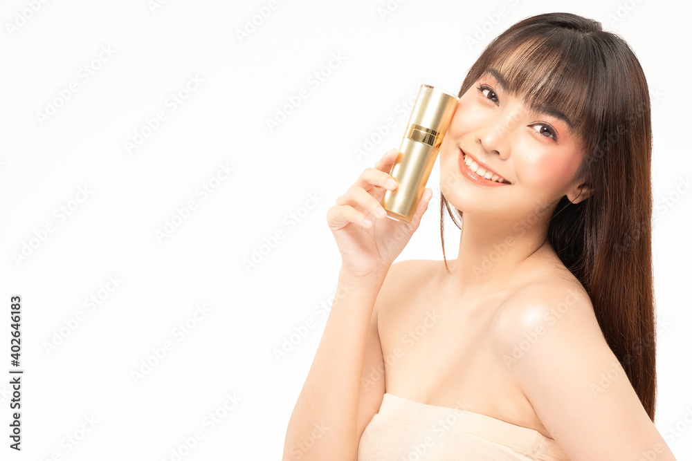 Beauty asian woman hold bottle cosmetic cream lotion and cheerful. Beauty asian woman hold bottle cosmetic cream lotion and cheerful.