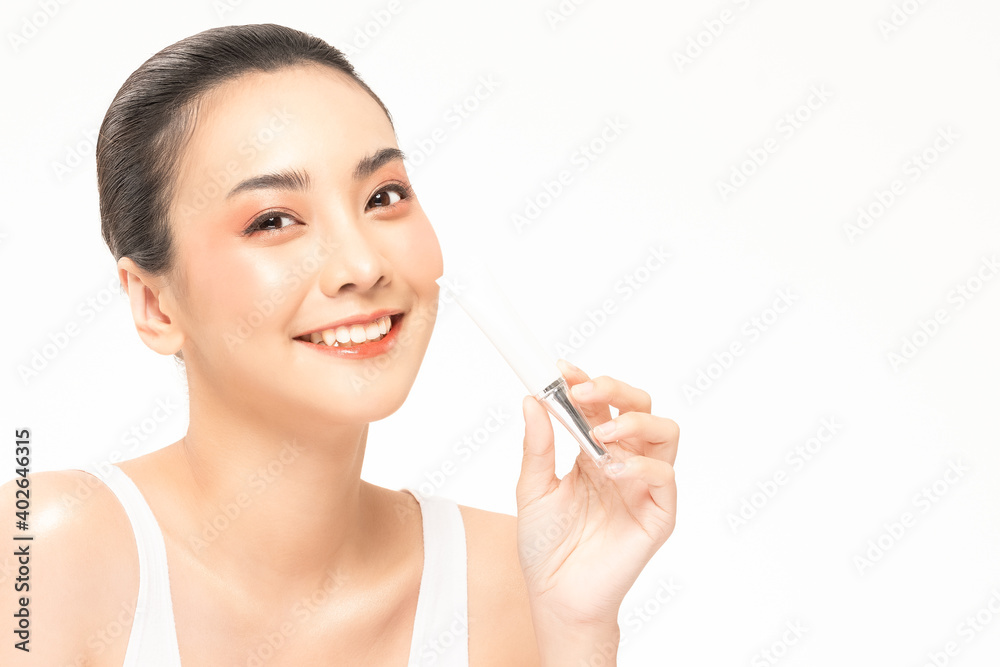 Beauty asian woman hold bottle cosmetic cream lotion and cheerful. Beauty asian woman hold bottle cosmetic cream lotion and cheerful.