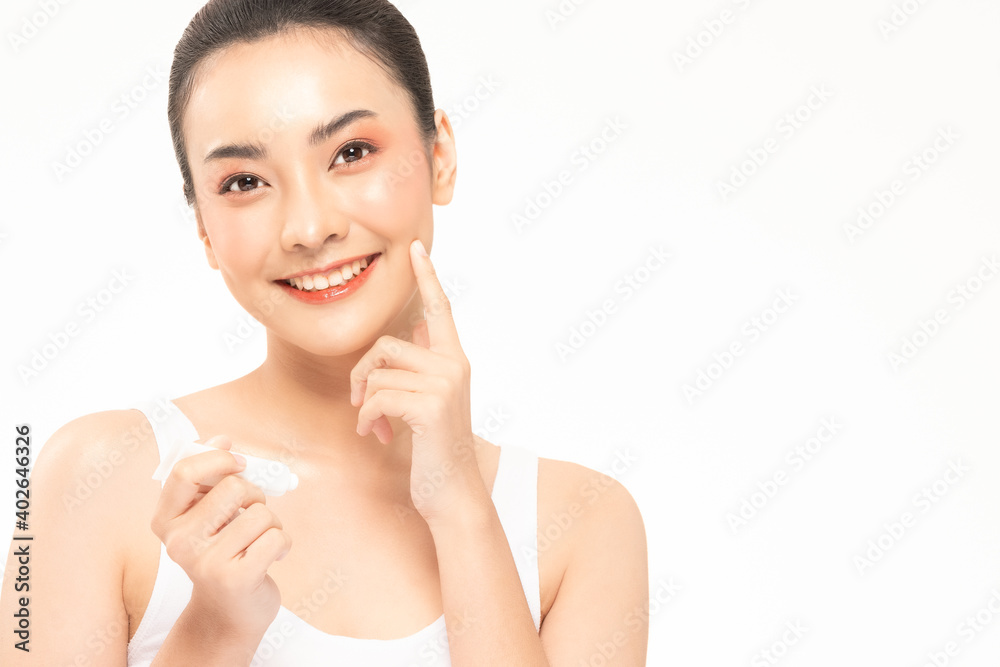 Beauty asian woman hold bottle cosmetic cream lotion and cheerful. Beauty asian woman hold bottle cosmetic cream lotion and cheerful.