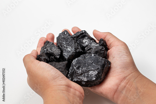 coal raw in hand