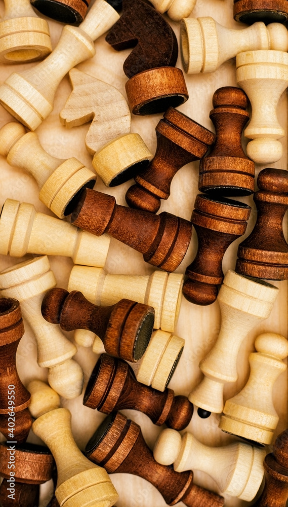 Chess pieces close-up. Black and white figures of different designations. Board game. Chess pieces close-up. Black and white figures of different designations. Board game.