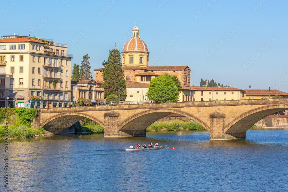 Arno River in Florence with a rowboat