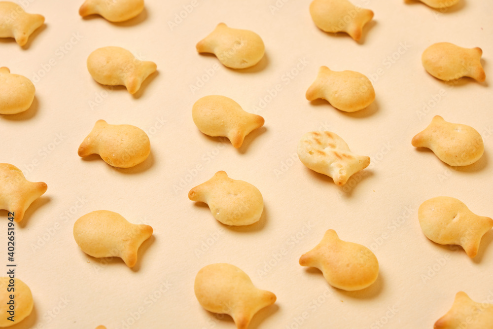 fish crackers on beige background top view fish crackers on beige background top view
