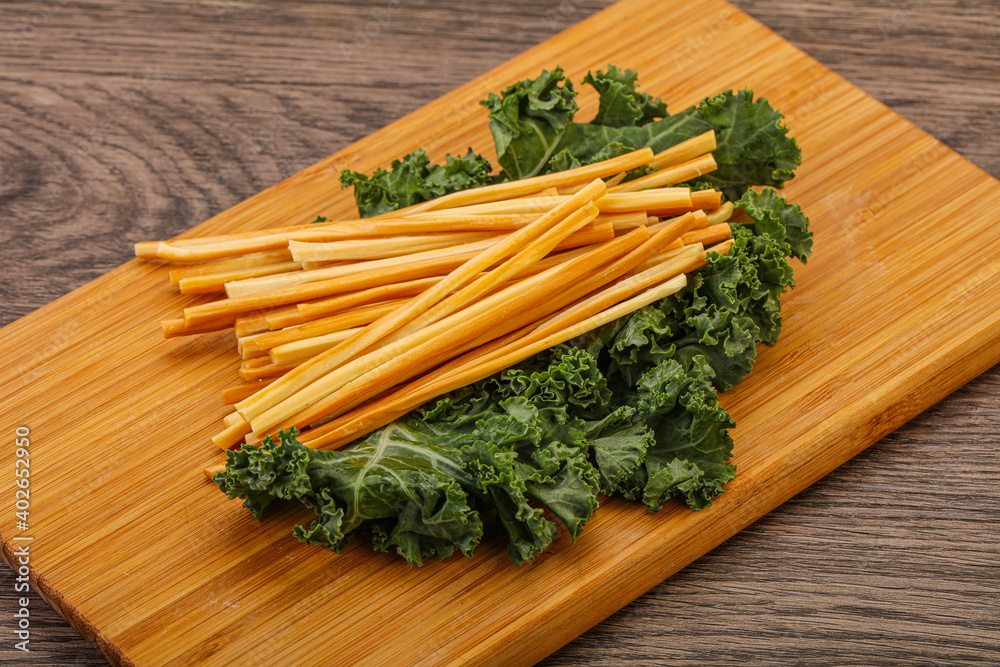 Chechel cheese sticks over board Chechel cheese sticks over board