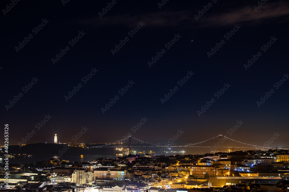 Lisbon, Portugal at night. Winter solstice 2020. Great conjunction of Jupiter and Saturn