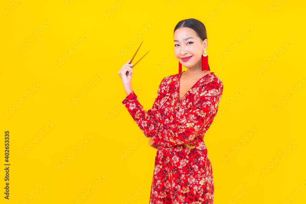 Portrait beautiful young asian woman with chopsticks