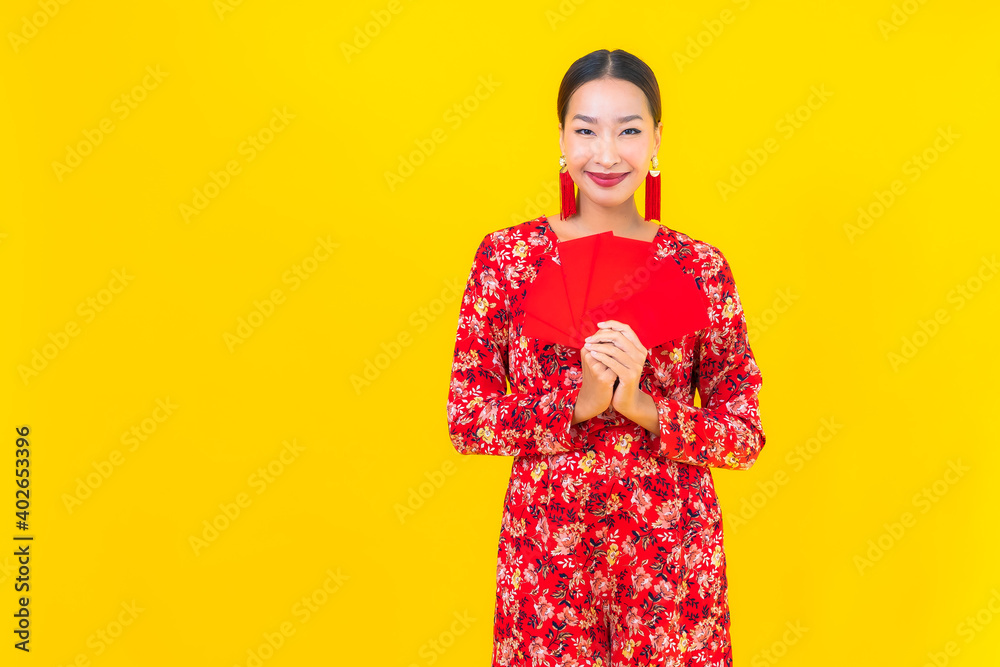 Portrait beautiful young asian woman with red envelopes Portrait beautiful young asian woman with red envelopes