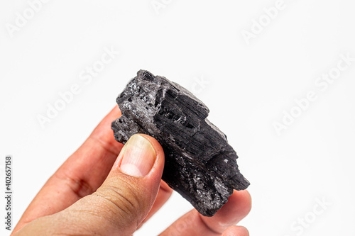 coal raw in hand