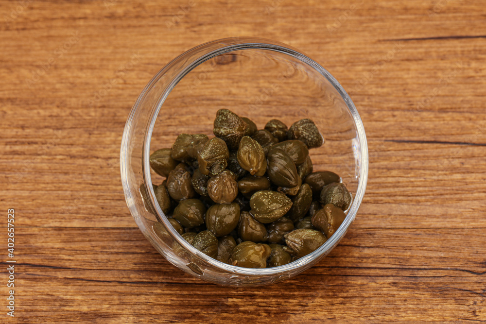 Tasty capers in the bowl Tasty capers in the bowl