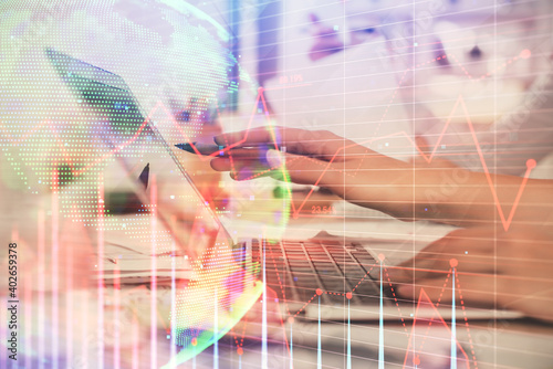 Wallpaper Mural Multi exposure of woman hands typing on computer and financial graph hologram drawing. Stock market analysis concept. Torontodigital.ca