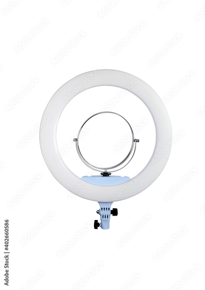 Closeup of circular neon LED lamp isolated white background. Popular modern light for make-up and beauty portraits. Closeup of circular neon LED lamp isolated white background. Popular modern light for make-up and beauty portraits.
