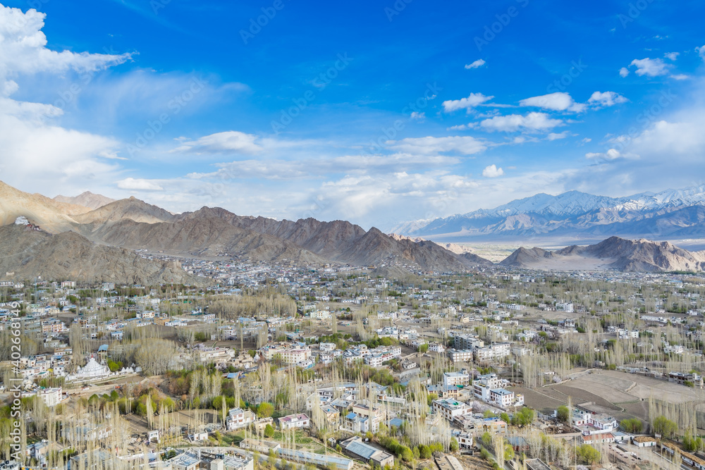Aerial view  of Leh Ladahk City of Kashmir with background of Himalaya mountain against blue sky, view from the Shanti Stupa