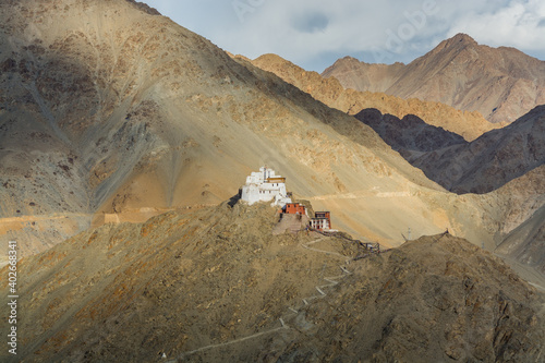 Namgyal Tsemo Monastery with background of Himalayas mountains and  beautiful evening light, view from Shanti Stupa,  Leh, Ladakh, India controlled Jammu and Kashmir photo