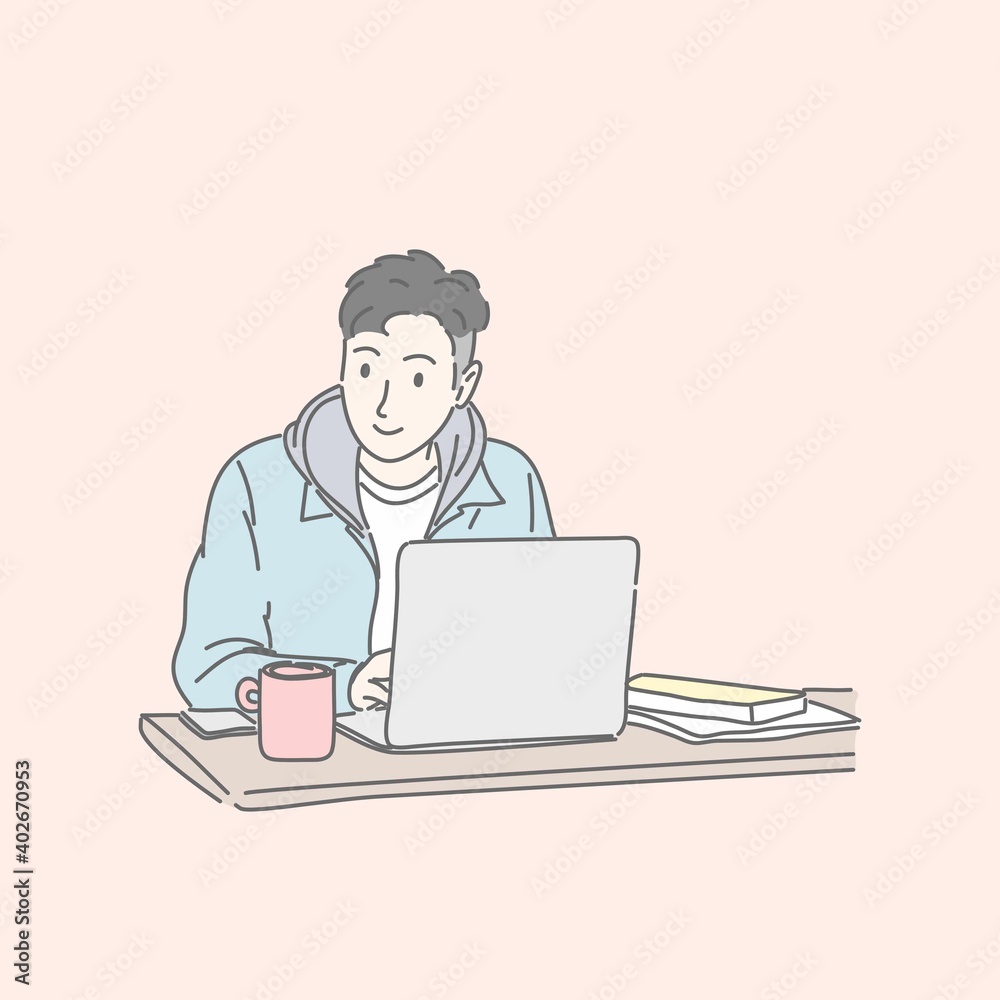 Man sitting and using laptop computer